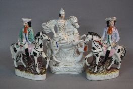 THREE VICTORIAN STAFFORDSHIRE POTTERY FIGURES OF 'D. TURPIN' AND 'T.KING', heights approximately