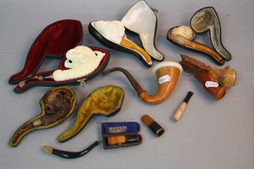 A LATE 19TH CENTURY MEERSCHAUM PIPE, the bowl carved as a negro gentleman, mouthpiece s.d., together