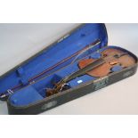 A HEINRICH SCHWARZ VIOLIN, with paper label Leipzig 1884, with a bow, in wooden case, all in need