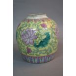 A CHINESE YELLOW GROUND GINGER JAR, painted with large blooms between geometric borders, red seal