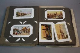 POSTCARDS, an old time postcard album and an unbound album including Pre WWI Naval interest, HMS