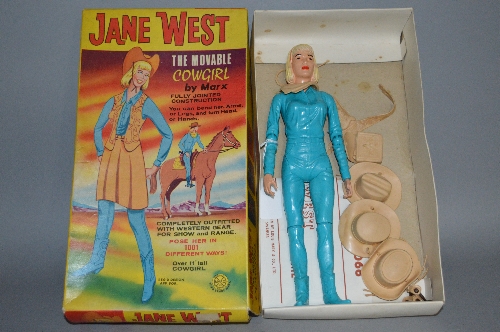 A BOXED MARX JANE WEST COWGIRL, No.2066, from the Johnny West series, complete with some of the