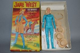 A BOXED MARX JANE WEST COWGIRL, No.2066, from the Johnny West series, complete with some of the