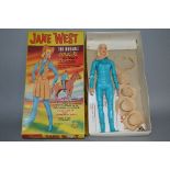 A BOXED MARX JANE WEST COWGIRL, No.2066, from the Johnny West series, complete with some of the