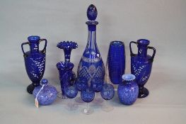 A COLLECTION OF LATE 19TH AND 20TH CENTURY BLUE COLOURED GLASSWARE, including a pair of twin handled
