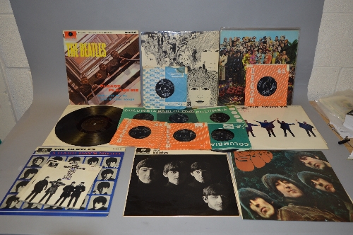 THE BEATLES, seven L.P's and nine singles including a black and gold 1st pressing of Please Please