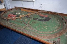 A OO GAUGE THREE RAIL MODEL RAILWAY LAYOUT, comprising two ovals and figure of eight track layout,