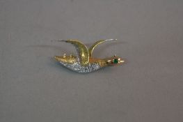 A LATE 20TH CENTURY 18CT GOLD BIRD IN FLIGHT BROOCH, three colour gold textured design with an