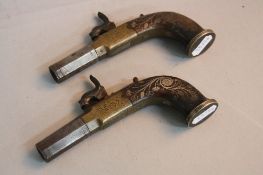 A PAIR OF APPROXIMATELY 50 BORE PERCUSSION POCKET PISTOLS, fitted with 1 5/8'' damascus octagonal