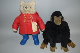 A GABRIELLE DESIGNS PADDINGTON BEAR, red duffle coat (some fading), blue wellingtons (later versions
