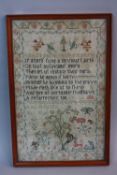 A LATE 18TH/EARLY 19TH CENTURY NEEDLEWORK SAMPLER, floral border surrounding angels and birds