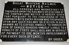 A CAST IRON GREAT WESTERN RAILWAY TRESPASS SIGN, white lettering on black background, size