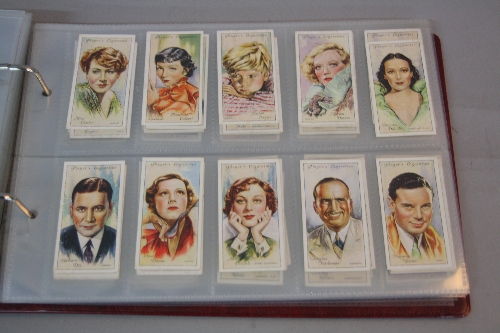 A CIGARETTE CARD ALBUM, containing loosely inserted cards all featuring Film Stars, mixture of - Image 2 of 3