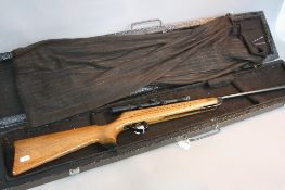 A MK1 .22'' B.S.A. METEOR AIR RIFLE, serial number T44445, fitted with a 4 x 20 scope and comes with