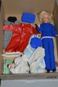 AN UNBOXED PALITOY 'TRESSY' DOLL, with a quantity of clothing, accessories, stand and literature