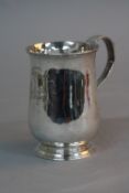 A GEORGE III SILVER MUG, 'S' scroll handle, the baluster body engraved with initials and scrolled