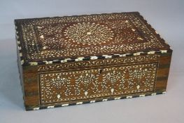 A VICTORIAN STYLE ANGLO INDIAN DRESSING BOX, of rectangular form, the exterior inlaid with foliate