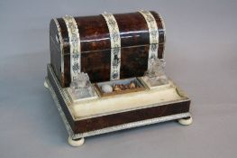 A MID 19TH CENTURY ANGLO INDIAN TORTOISESHELL, IVORY AND SANDALWOOD DESK STAND, the dome top