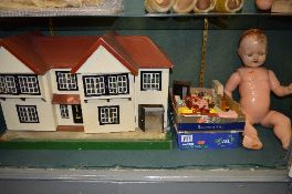 A TRI-ANG CEX DOLLS HOUSE, has been partially repainted and is in need of some minor restorations,