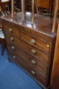 AN EDWARDIAN MAHOGANY CHEST OF TWO SHORT AND THREE LONG DRAWERS, with brass drop down handles,