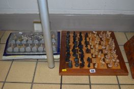 THREE CHESS SETS, (one missing a pawn) and a board
