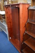 A STAINED PINE OPEN BOOKCASE, approximate height 153cm x width 87cm