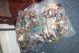 SEVEN BAGS OF COSTUME JEWELLERY