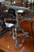 A HAND BUILT BRASS TOPPED OCCASIONAL TABLE, frame made from a set of antelope antlers