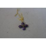 A 9CT FLOWER PENDANT ON 9CT CHAIN, approximate weight 3.1 grams