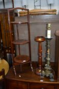 A MAHOGANY FOLDING CAKE STAND, a wooden ash tray and a table lamp (3)
