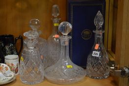 FIVE CUT GLASS DECANTERS, to include boxed Thomas Webb