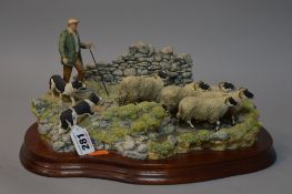 A BORDER FINE ARTS FIGURE GROUP, 'The Crossing', (shepherd, sheep and collie) B0013 by Ray Eyres (
