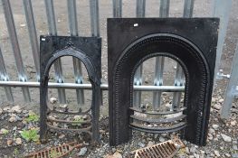 TWO CAST IRON FIRE BACKS AND GRATES