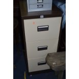 A METAL THREE DRAWER FILING CABINET, (key)