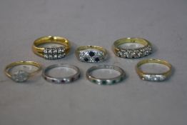 SEVEN RINGS, to include a late 2oth Century 18ct gold diamond half eternity ring, total diamond