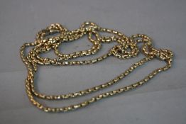 A 9CT MUFF CHAIN, hanging centre 76cm, approximate weight 42.4 grams