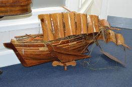 A SCRATCH BUILT WOODEN MODEL OF A THREE MASTED SHIP, on swivel stand, approximate length 110cm (in