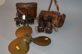 A PAIR OF BINOCULARS, by Lemaine of Paris, contained in a British military leather case, with a pair