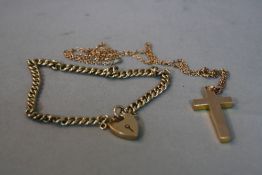 A 9CT CROSS ON A 9CT CHAIN, together with a 9ct locket on a 9ct bracelet, approximate weight 13.4