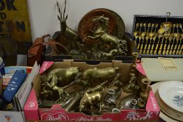 TWO BOXED BRASS AND OTHER METALWARES, to include candlesticks, animal figures, horse brasses etc