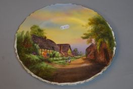 A ROYAL WORCESTER CABINET PLATE, 'Little Comberton', puce backstamp, approximate diameter 27cm