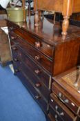 A VICTORIAN MAHOGANY AND INLAID SECRETAIRE CHEST, of four drawers with fitted interior and fall