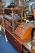 AN EDWARDIAN MAHOGANY PURDONIUM (sd, losses), together with a mahogany drop leaf table and an oak