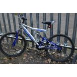 A REEBOK MANIOC FULL SUSPENSION MOUNTAIN BIKE, 16' frame, 18 gears