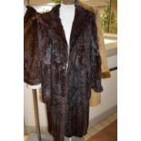 A LONG FUR COAT and a suede effect coat, size 18 (2)