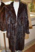 A LONG FUR COAT and a suede effect coat, size 18 (2)