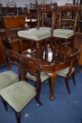 A VICTORIAN MAHOGANY WIND OUT DINING TABLE, approximate size width 119cm x depth 105cm, five