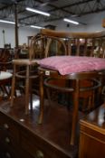 A BENTWOOD BOW SMOKERS ARMCHAIRS and another bentwood chair (2) (s.d)