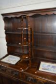 AN OAK FOLDING CAKE STAND, two framed watercolours and a carpet runner (4)