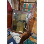 AN OAK FIRESIDE CHAIR, two deck chairs, a rug and an oak framed mirror (5)